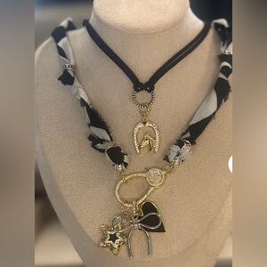 New. Never worn. Handmade Elegant Black and Gold Charm Necklace